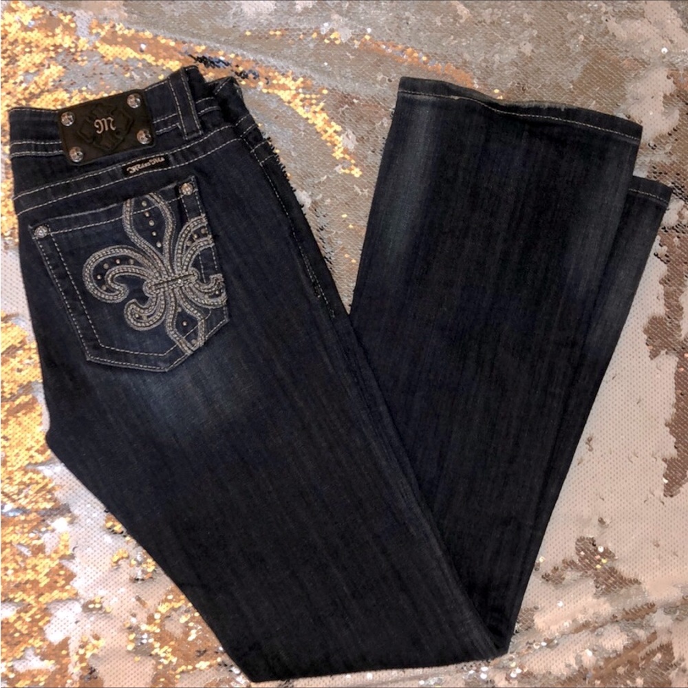 Miss me 30 boot cut, 34 inseam. Signs of wear but still In good condition.